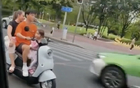 譚警官：中超球員家庭未戴頭盔騎電動(dòng)車馬路中央